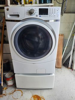 GE ELECTRIC FRONT LOADING WASHING MACHINE IN GOOD WORKING CONDITION