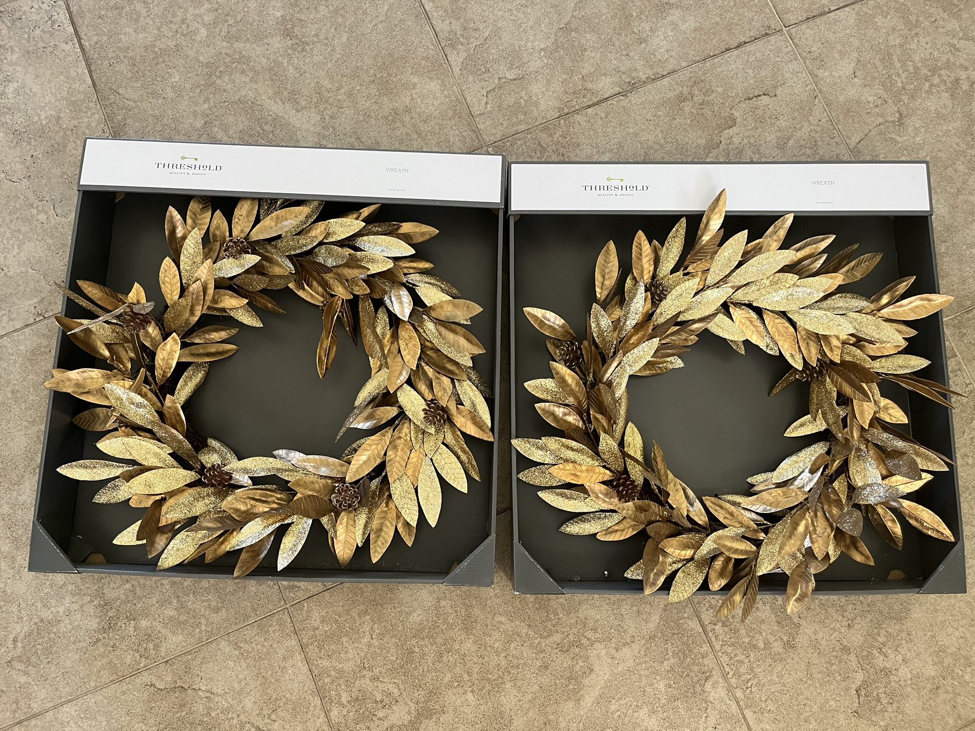 Two brand new rare gold wreaths 