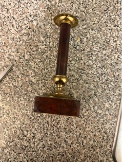 Granite or obsidian candle thing