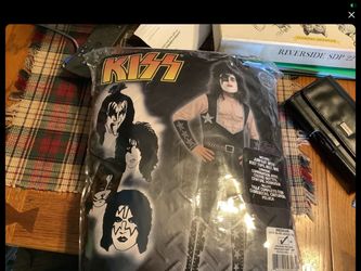 Kiss The Starchild Adult costume for Halloween. Comes with outfit, wig, belt, mask, shoe covers Excellent condition  This is an adult Medium Halloween