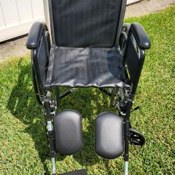 LARGE NEW WHEELCHAIR 