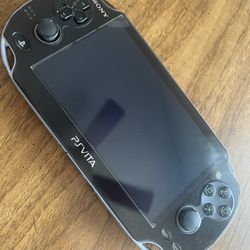 PsVita OLED + Charger & 64gb Memory