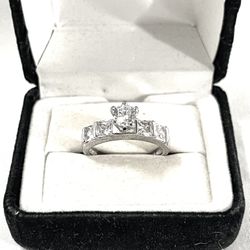 Brand New Cubic Zirconia C Diamonds Set In A Sterling Silver Wedding Ring. Size 7.5