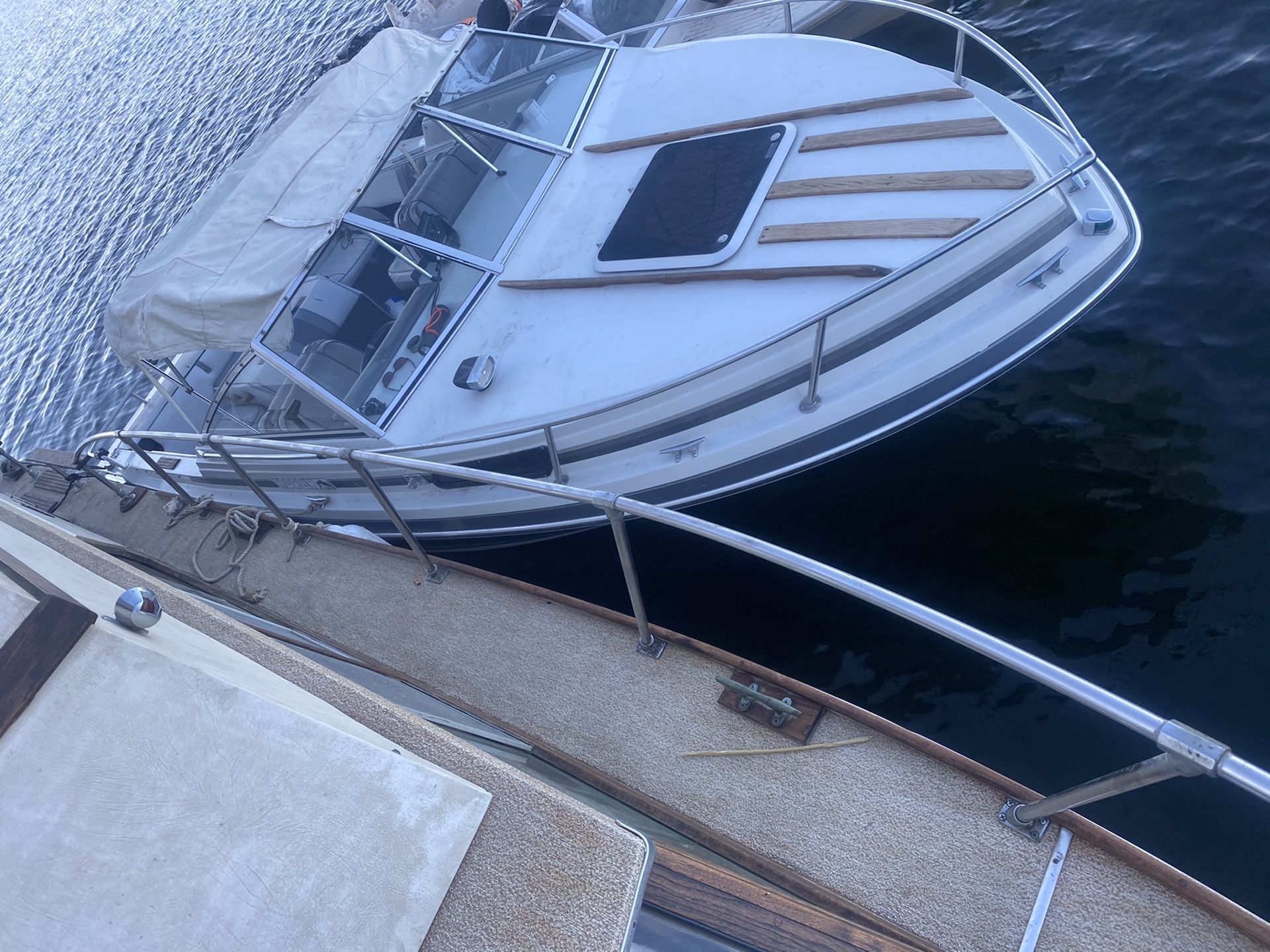 Marlin 1988 19 ft 5.0 mercrusier out drive this is a mans fishing boat sides are waist high cuddly cabin everything works tagged with trailer tandem