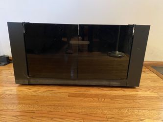 TV Stand Black Glass Doors 39” Wide, 21” Deep, 17” High With Wheels. You’re Reading This, It’s Available.
