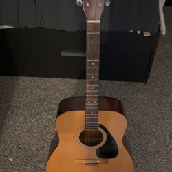 Yamaha F-310 Acoustic Guitar With Stand, Picks, And Capo