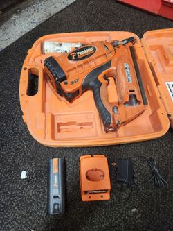 Paslode gas framing nail gun.