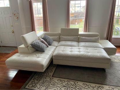 A Beautiful Pearl White Sactional + Ottoman