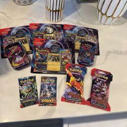 Pokemon phantasmal flames , destined rivals etc, two packs , tins, and sleeves