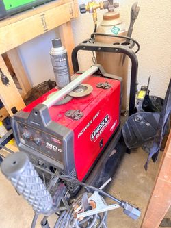 140 welder like new (just welder) cart and bottle not included