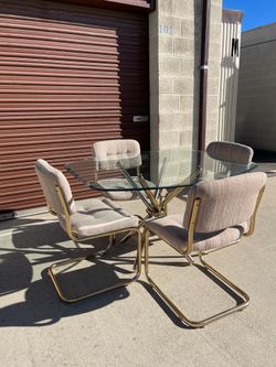 MCM Postmodern Brass Knot glass table and seats