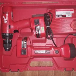 Milwaukee 14.4 Volt Drill And Flashlight Kit With Batteries Charger And Hard Shell Case for Sale in Grandview MO OfferUp