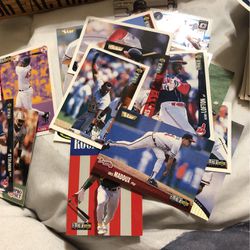 Baseball football and basketball cards