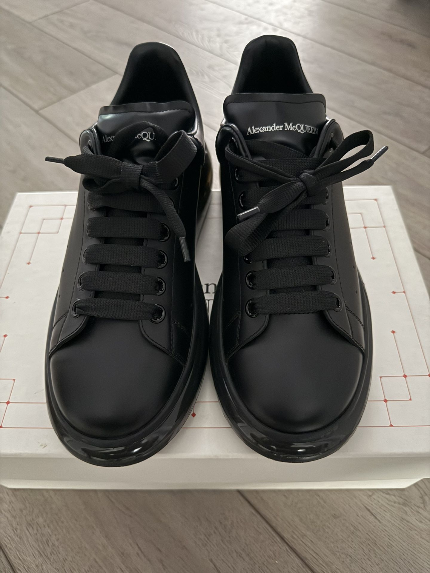 Alexander McQueens Black Shinny Sole Edition