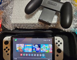 The Nintendo Switch White OLED "Excellent condition"