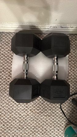 Like brand new 45 lbs dumbbells rubber coated paid 140& sell for 60$ pup only