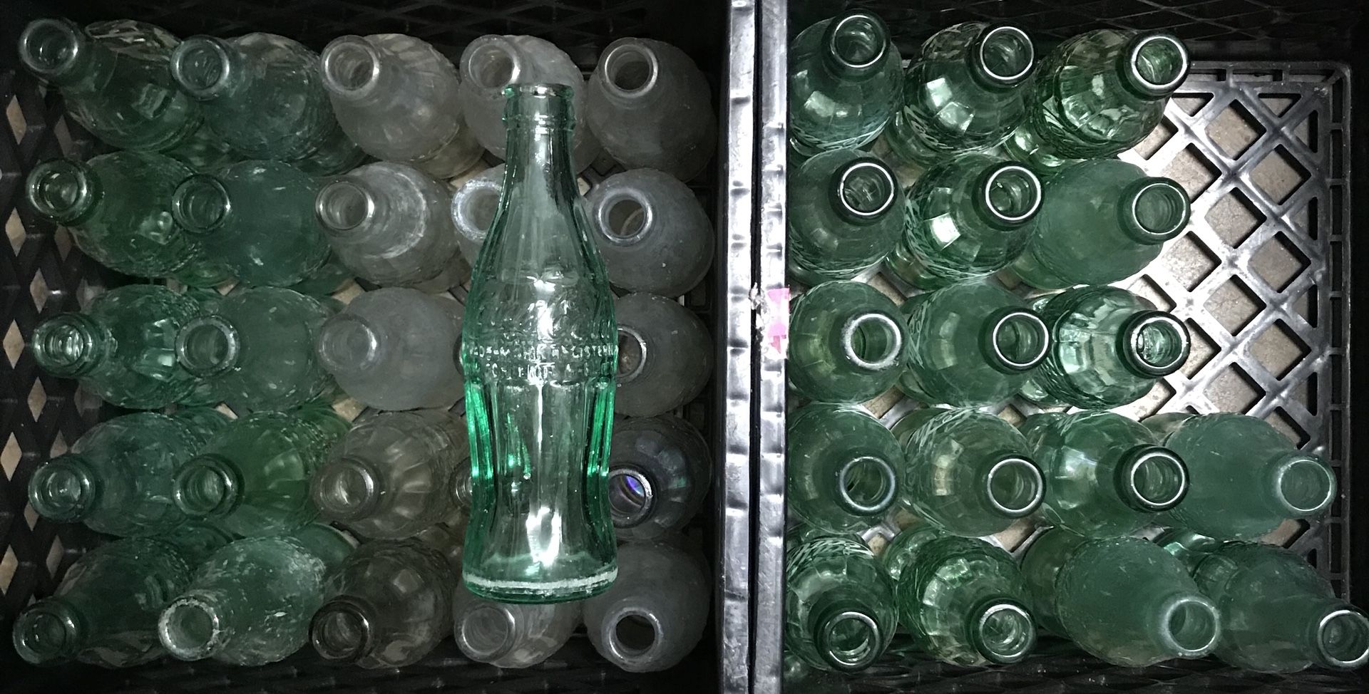 43 old Coca Cola soda bottles