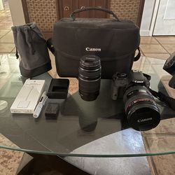Canon EOS Rebel SL1 with 2 Lens (24-105mm EF 1:4 L IS USM & 55-200mm) open to offers