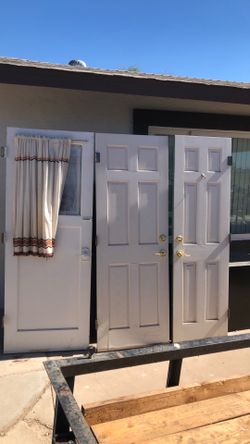 Solid wood doors $15 DLLs each.  All 3 for $30.
