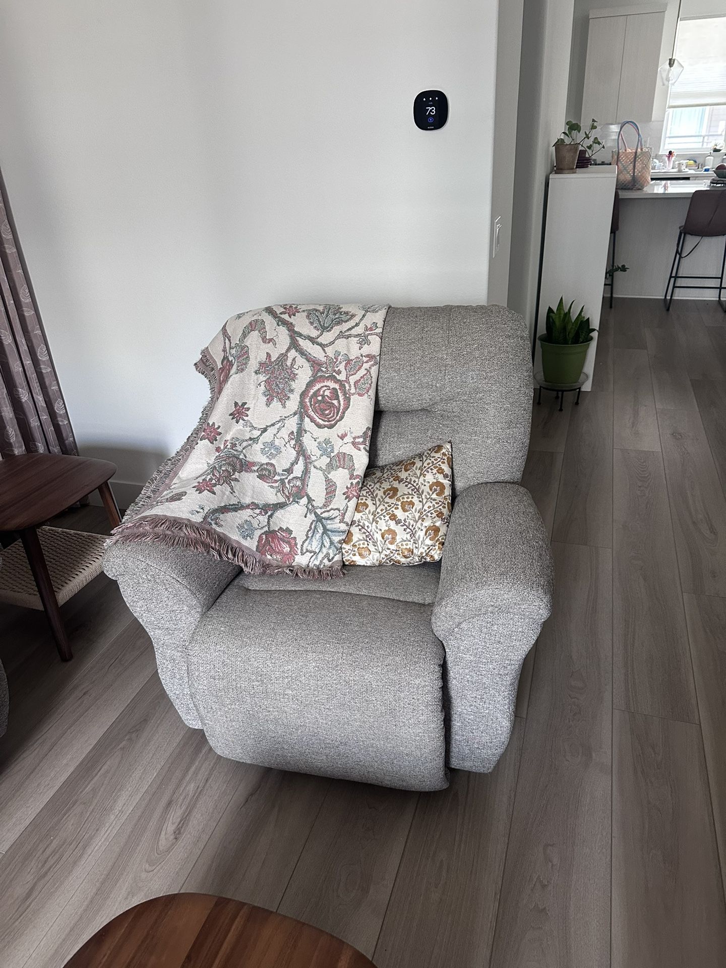 Living Spaces Swivel Glider Recliner Chair