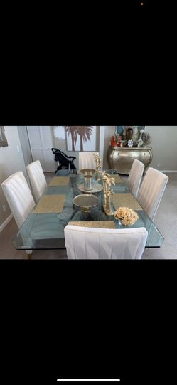 gold dinneing room table with decor