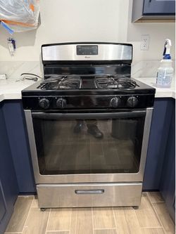 Stove, over range microwave dishwasher and Refrigerator