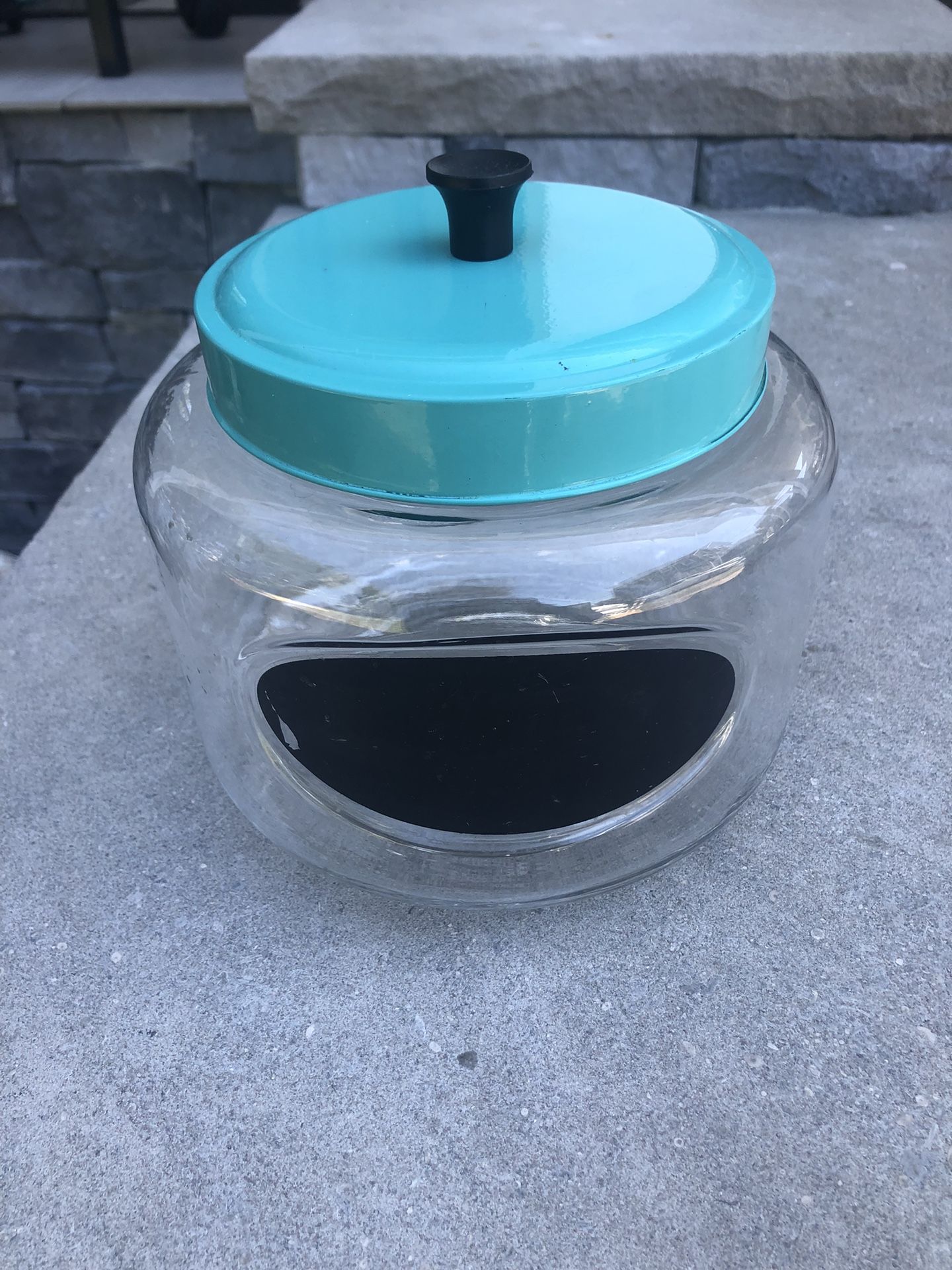 Glass jar with turquoise, metal lid and chalkboard label