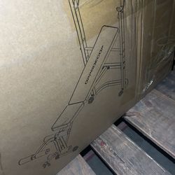 Brand new weight bench in box
