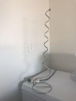 Spiral metal toilet paper holder