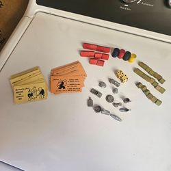 Vintage monopoly game pieces wood.