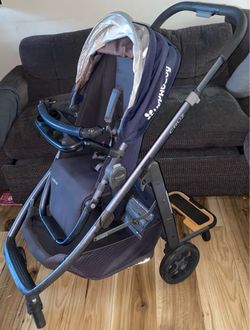 Uppababy Cruz Stroller and Piggyback board