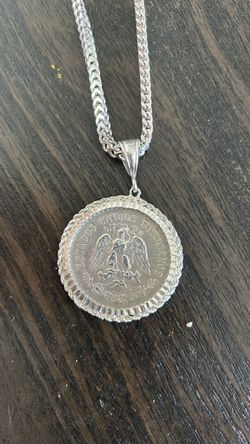 Silver chain and pendant with coin