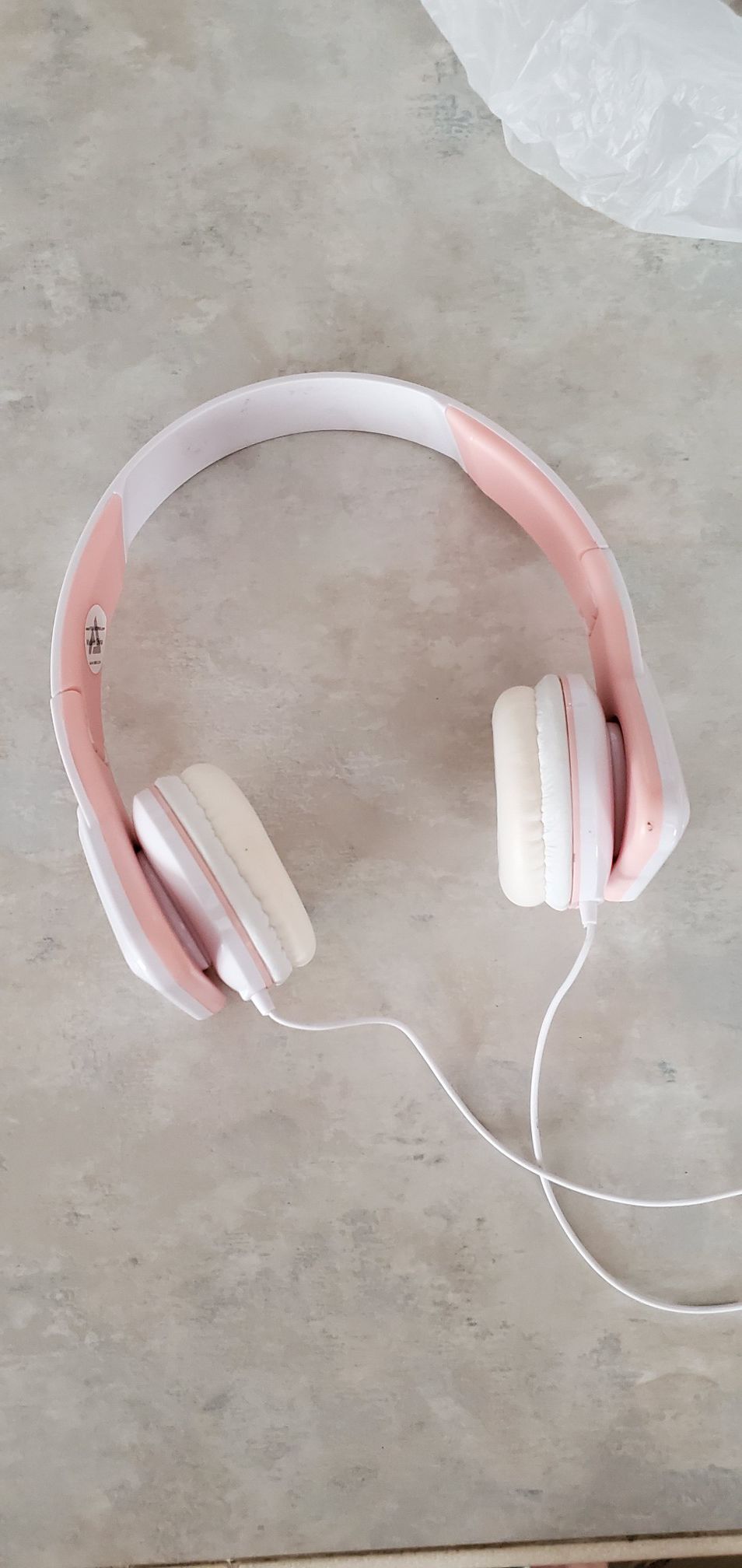 Pink and white headphones