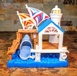 Matchbox 2006- Surf -Shop Toy • Shark Nantical Light House • Blue/White • Shark's Mouth Opens Showing All Teeth & Shuts Closed • Missing Car Ramp .