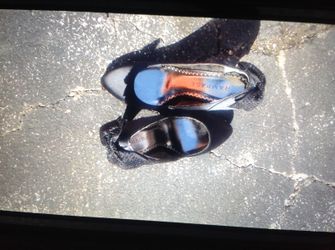 Black heels with sequence bow on back