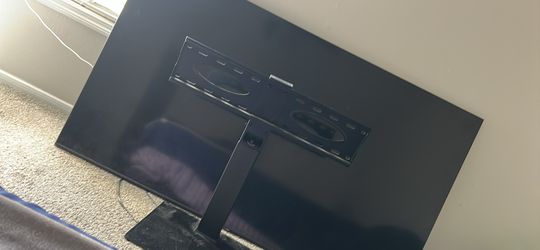 Samsung 65 inch tv and stand included