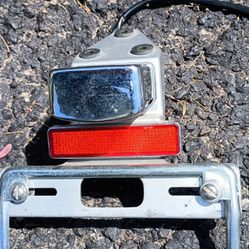 License Plate Holder With Light, Reflector And The Frame That Holds License Plate On For A Suzuki Savage 650 