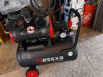 Powerful Nessxa air compressor for sale. This 10 gallon, 2.0 HP unit is oil-free and ultra quiet. Has wheels for easy moving around the garage or work