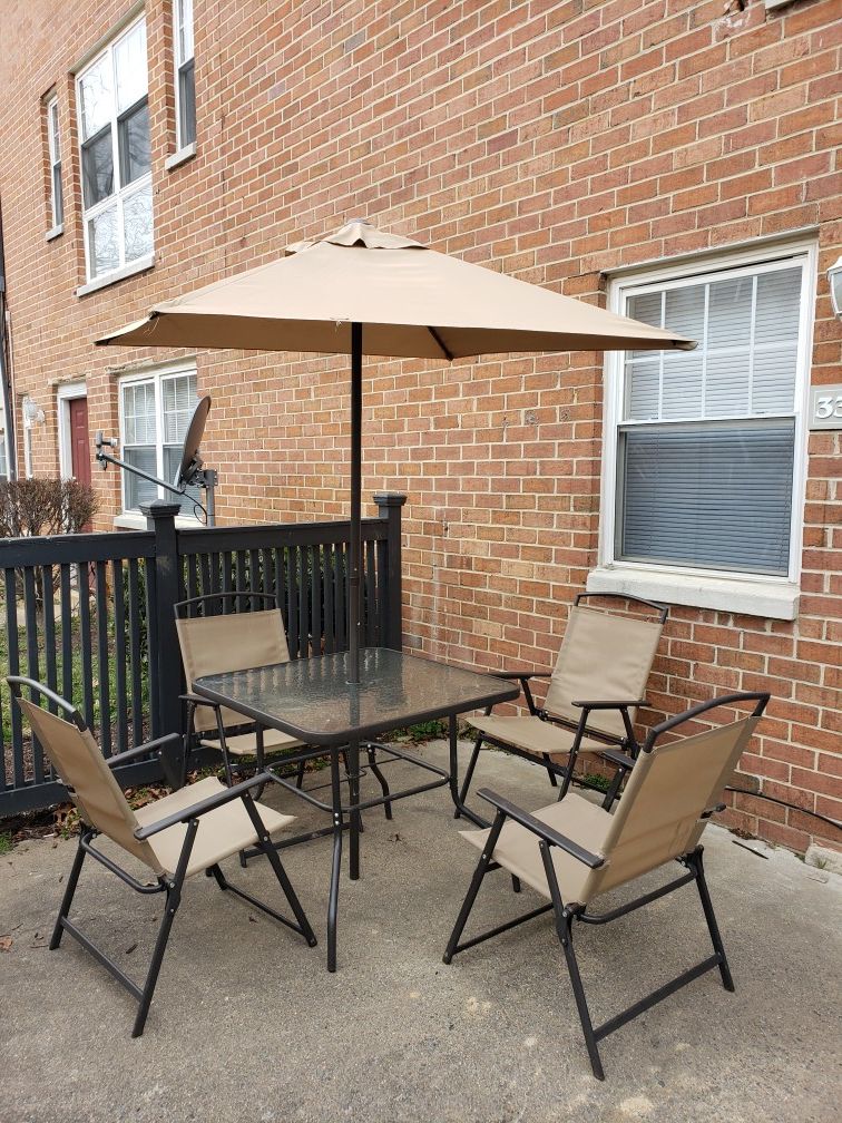 Outdoor Table with umbrella and 4 chairs