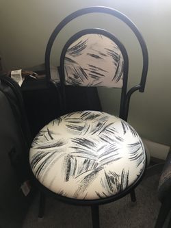 Set of four black and white chairs. Perfect condition