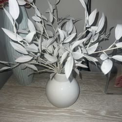 White artificial flower and vase 