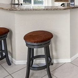 Set of 4 Swivel Bar Stools – Cowhide Seats