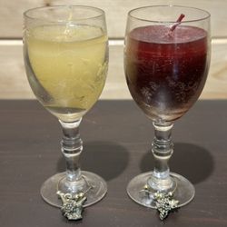 Adorable wine candles with charms. NWOT