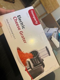Electric cheese grater