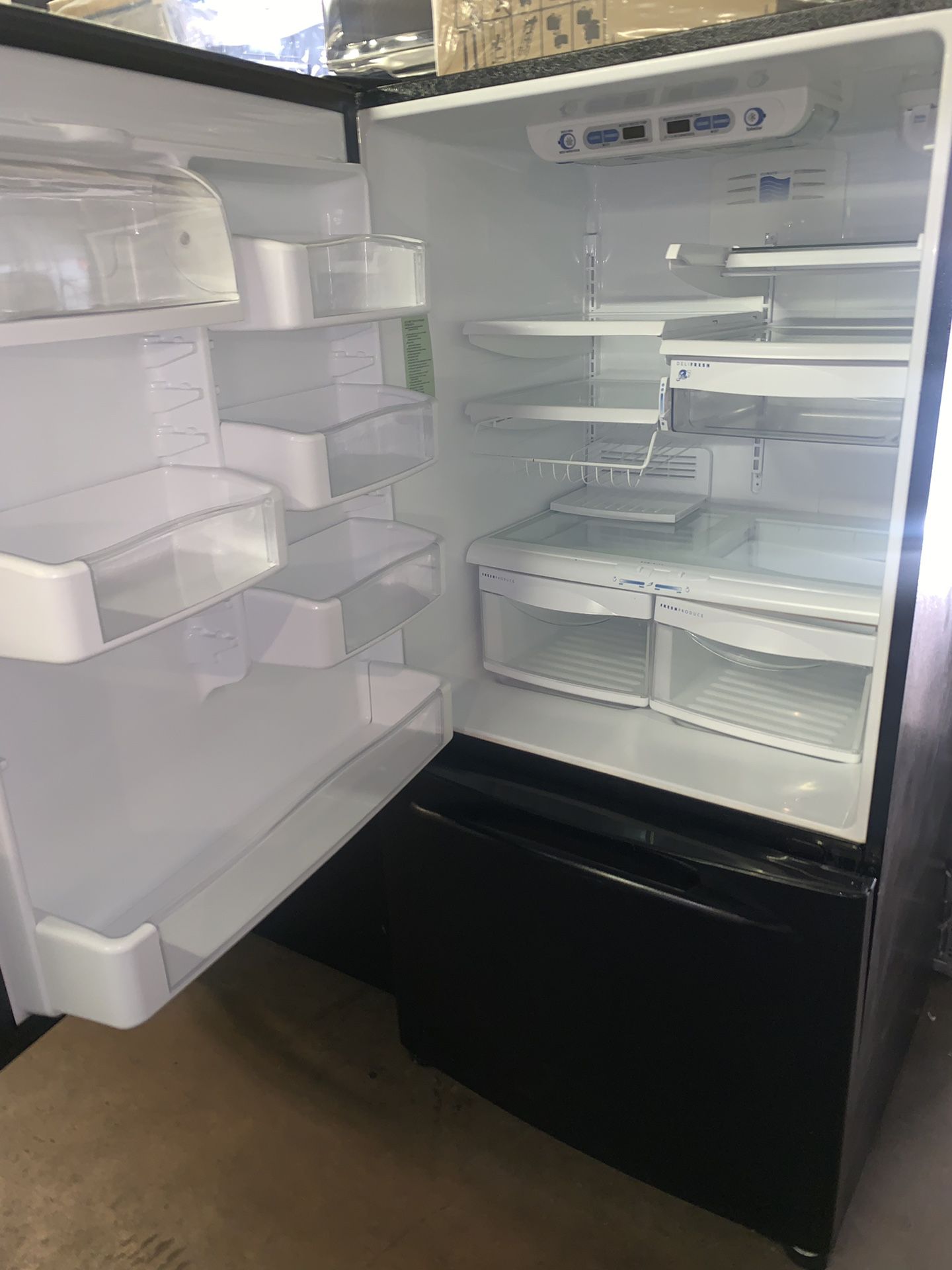 GE 33in. Bottom freezer refrigerator in excellent conditions