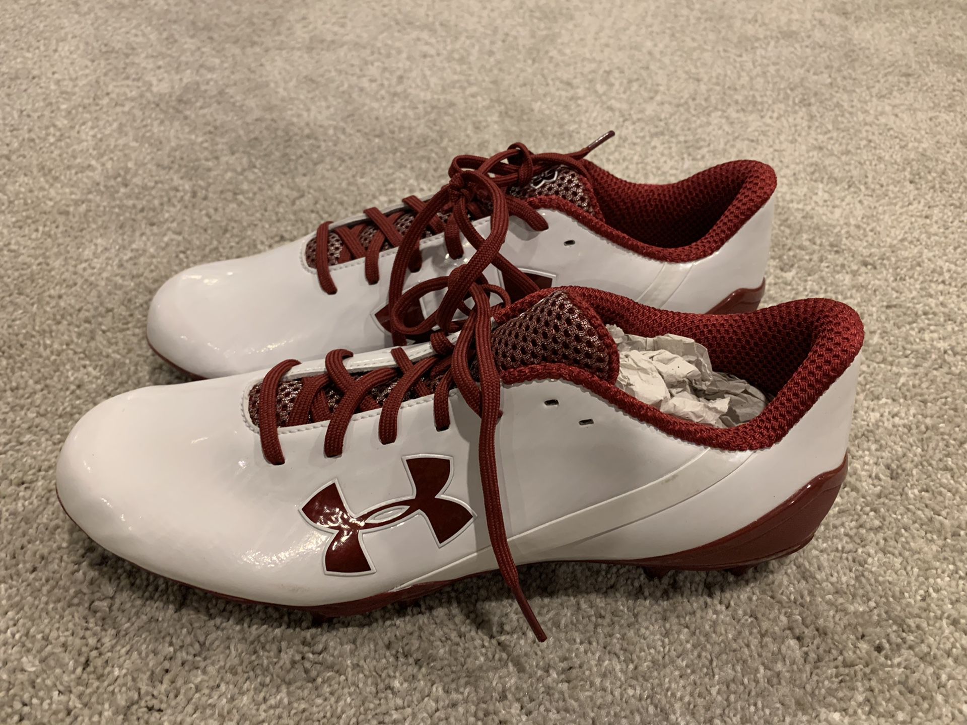 White/red Under Armour cleats size 11