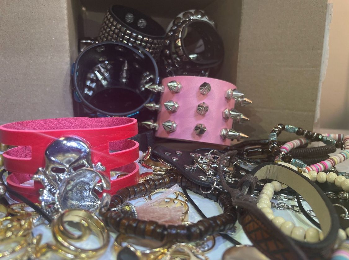 100 pcs of GOTHIC PUNK Random Jewelry Bulk - BRAND NEW - Faux Leather Bracelets , Necklaces , Rings, Keychains , earringsJewelry Box Lot , Random , Pu