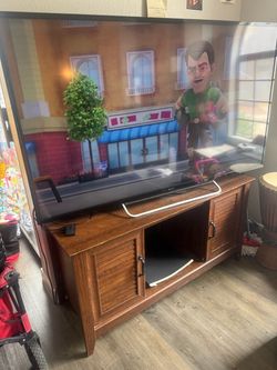 60” Sony TV and entertainment center