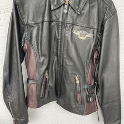 Harley Davidson women’s leather jacket & matching duffel bag