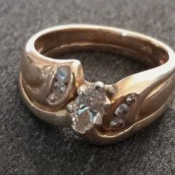 Vintage 14K Gold Diamond Wedding Ring Yellow 5.95 Grams .30 Carat Center Diamond with 6 side diamonds, 3 on each side. Rings used to be seperated but 